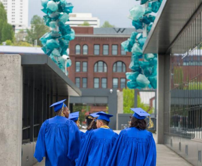grads walk in downtown tacoma